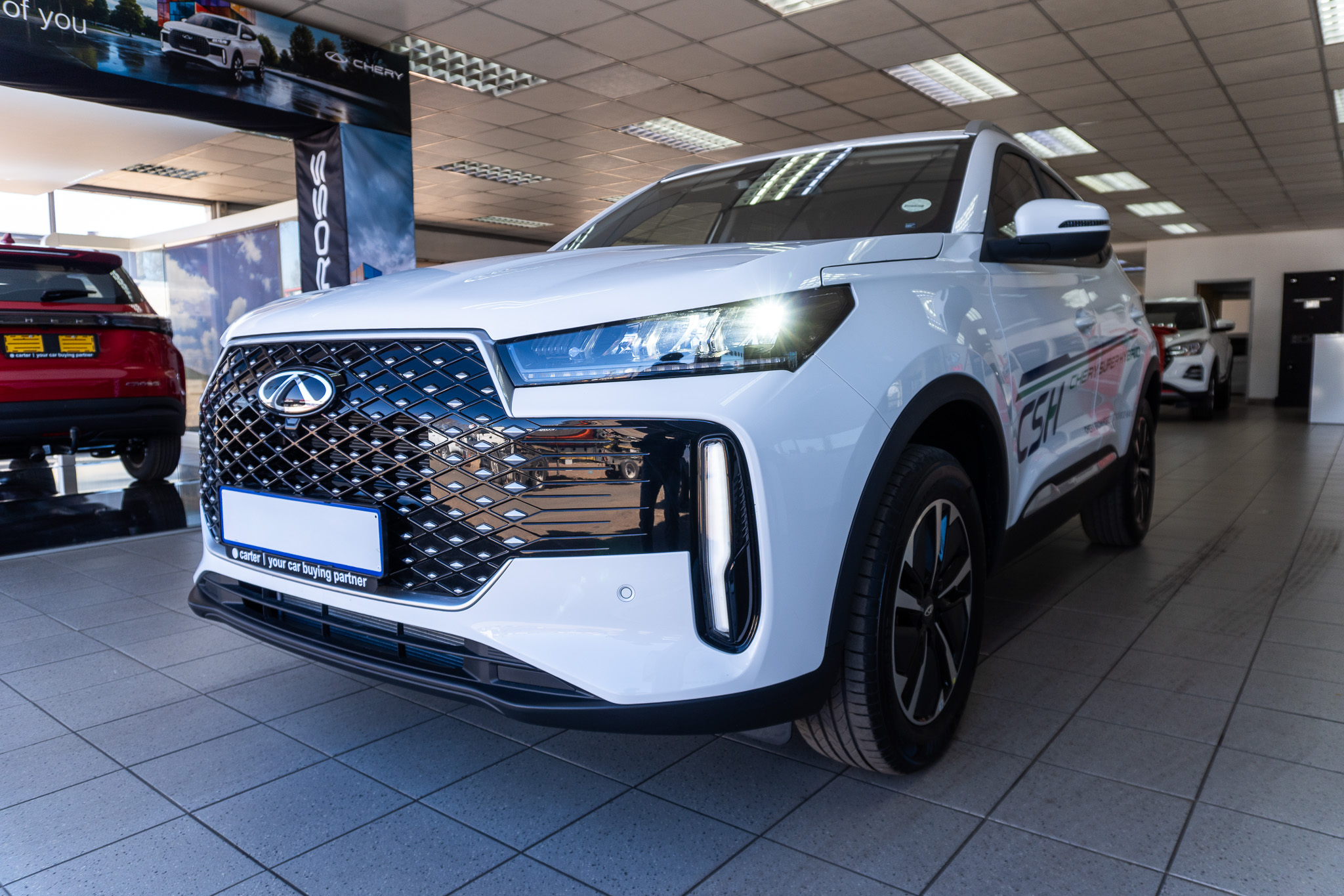 Chery Tiggo Cross 1.5 CSH HEV Elite 2025/115495_CherTiggC1e4.jpg